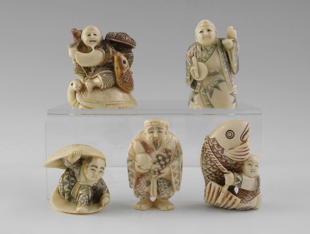 5 PIECE CARVED IVORY FIGURAL NETSUKE: 5 PIECE CARVED IVORY FIGURAL NETSUKE: To include 1) Polychrome figural group of fisherman with basket, fish and pheasant on back of turtle, signed, 2" h. x 1 3/4". 2) Man inside clam shell, signed, 1 