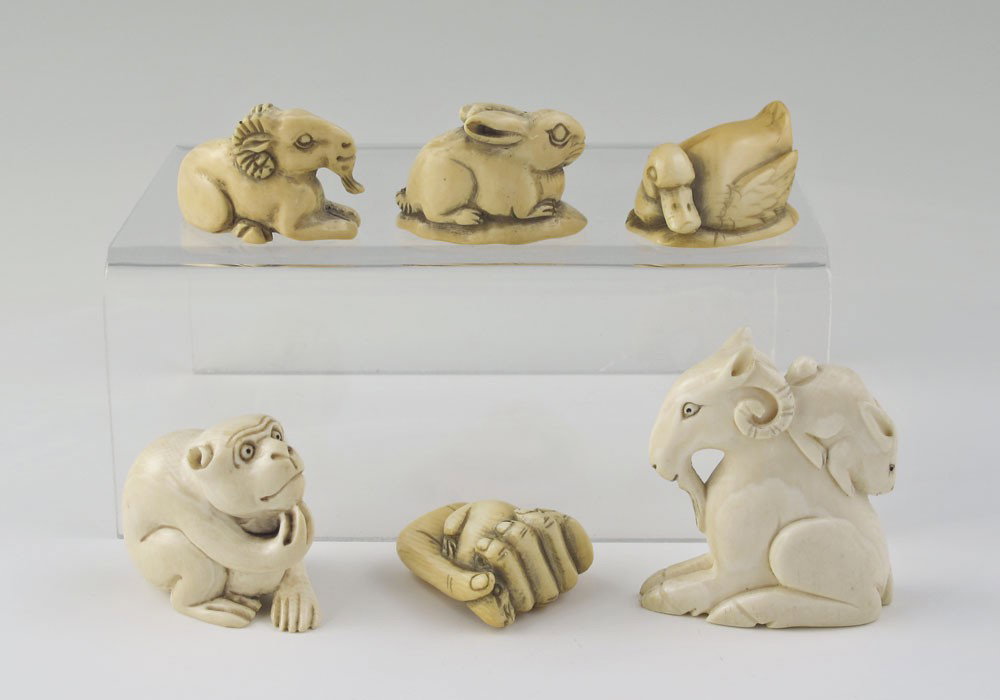 6 PIECE CARVED IVORY ANIMAL NETSUKE: 6 PIECE CARVED IVORY ANIMAL NETSUKE: To include 1) Goat with rabbit on back , signed, 2" h. x 1 3/4". 2) Monkey with turtle , signed, 1 3/8" h. 3) Rat catchers hand with rat, signed, 1 1/4" h. 4) Duck