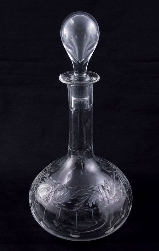 SIGNED HAWKES CUT GLASS DECANTER: SIGNED HAWKES CUT GLASS DECANTER: Intaglio cut with original hollow stopper. 12" tall.