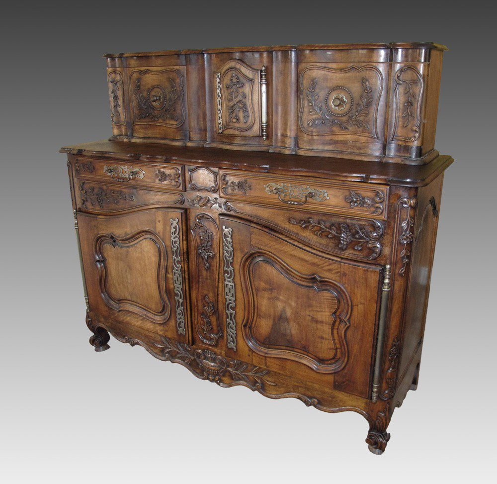 COUNTRY FRENCH CARVED WALNUT SIDEBOARD CABINET: COUNTRY FRENCH CARVED BLACK WALNUT SIDEBOARD CABINET: Mid 19th C. Two parts, the upper having three doors and being recessed above the lower cabinet of two drawers over two doors. Imported directly fr