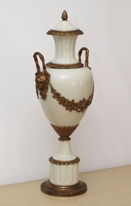 24" TALL FRENCH ORMOLU COVERED URN: FRENCH ORMOLU COVERED URN: 24" tall, gilt metal over cream porcelain.