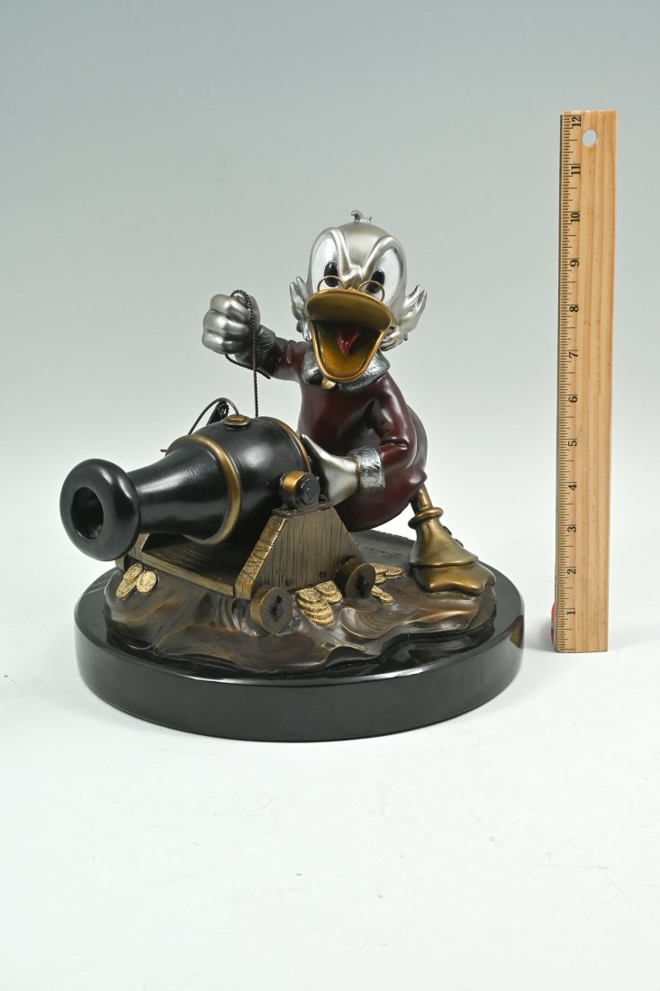 BRUCE LAU SCROOGE MCDUCK BRONZE SCULPTURE: BRUCE LAU SCROOGE MCDUCK BRONZE SCULPTURE: "Who's Out There?", approximately 11" in height with the polished bronze plinth, numbered 62/131. A true Disney collectible.