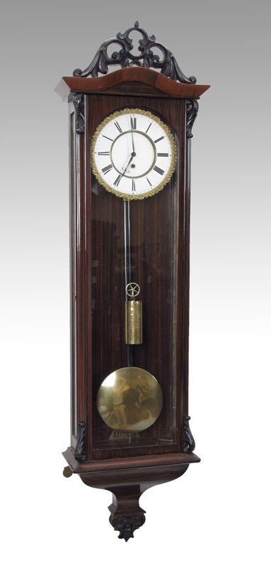 BIEDERMEIER SINGLE WEIGHT VIENNA REGULATOR CLOCK: BIEDERMEIER SINGLE WEIGHT VIENNA REGULATOR CLOCK: Carved crest over mahogany case with carved applied accents. Porcelain face with Roman numerals, pie crust bezel. Unmarked single weight 8 day movemen
