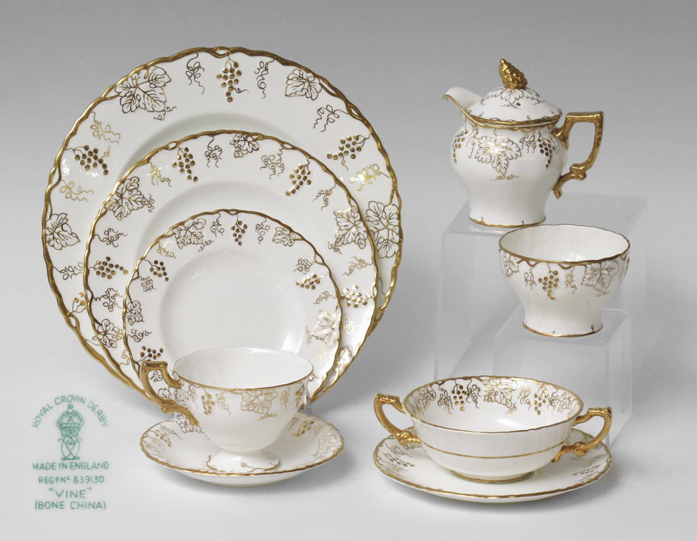 81 pc ROYAL CROWN DERBY ''VINE'' FINE CHINA FOR 10: CROWN DERBY FINE CHINA SERVICE IN THE VINE PATTERN: Approx. 81 pieces to include 10 dinner plates (10 1/4''), 11 salad plates, 12 bread plates, 11 cream soup with 12 underplates, 12 cups and 13 saucer