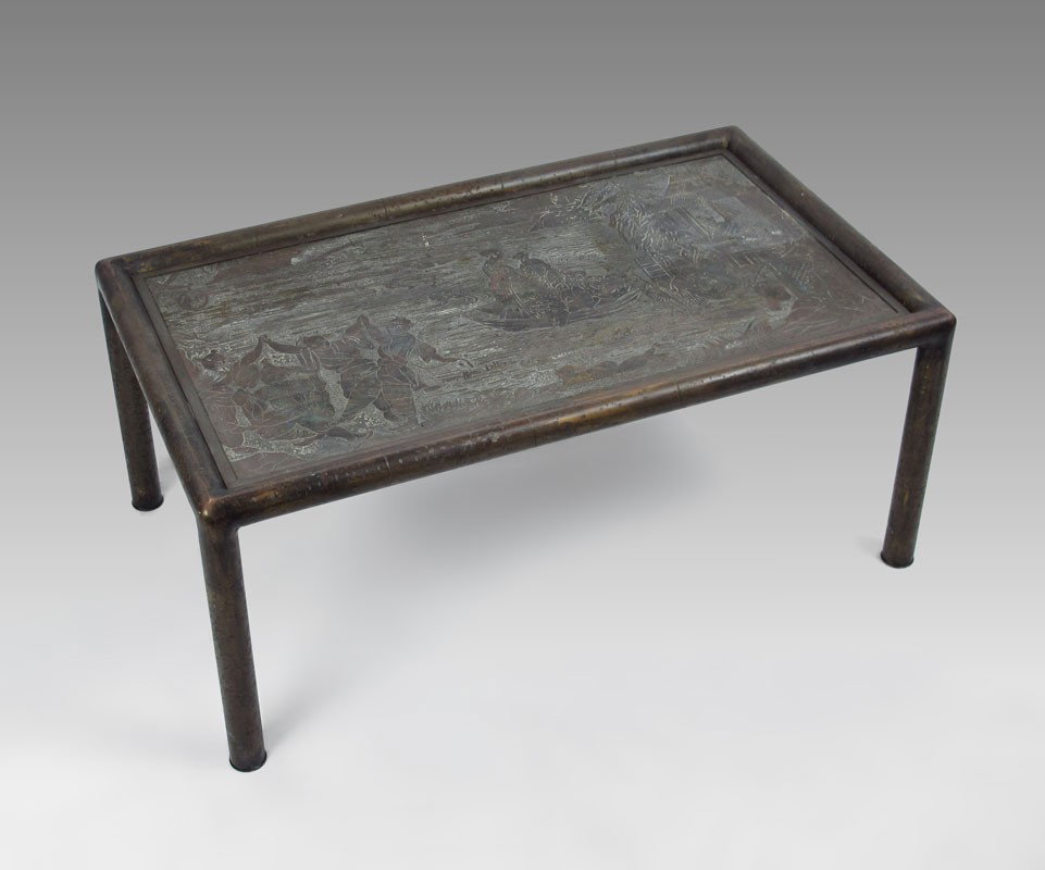 PHILIP AND KELVIN LAVERNE COFFEE TABLE: PHILIP AND KELVIN LAVERNE COFFEE TABLE: Oriental motif top of fishermen with traces of original enamel remaining, bamboo motif frame and legs. Signed Philip & Kelvin Laverne. 14 1/2" h. x 34" x 19 3/4