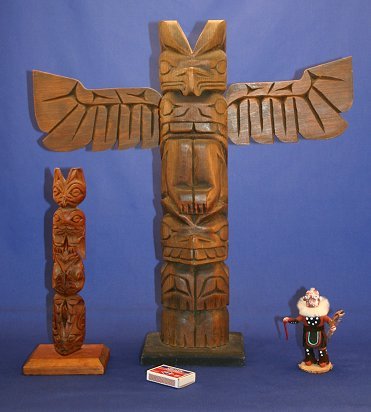 3 PC SCULPTURE LOT WITH TOTEM CARVINGS AND KACHINA: 3 PC AMERICAN INDIAN SCULPTURE LOT TO INCLUDE 2 TOTEM CARVINGS AND A TINY KACHINA DOLL: Measurements respectively are 19", 11", and 4", respectively signed H. Rudick, John Williams, and illegible.