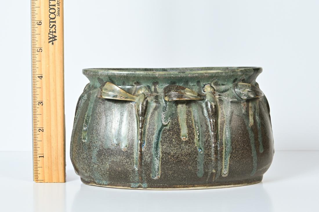 DENBAC DRAGONFLY VASE: DENBAC DRAGONFLY VASE: Denbac France jardiniere, pattern no. 35, oval form with a band of molded dragonflies having raised, overlapping wings. With flared rim and mottled crystalline drip glaze. Signe