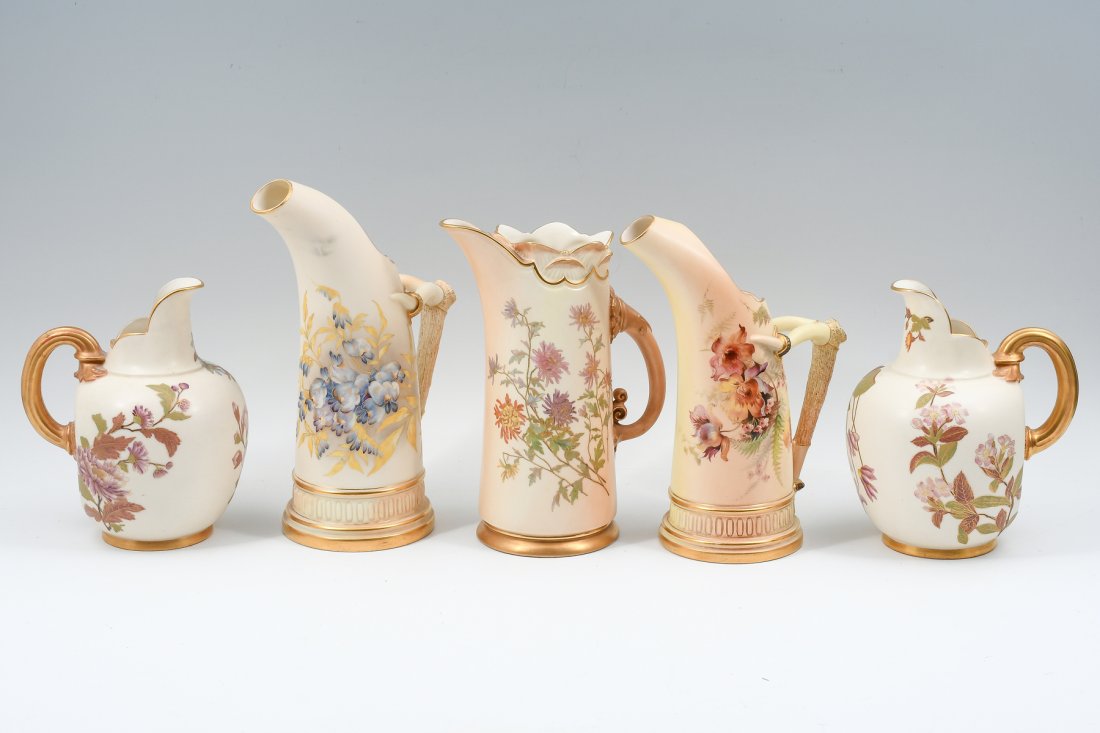 5 PC. ROYAL WORCESTER PORCELAIN PITCHERS: 5 PC. ROYAL WORCESTER PORCELAIN PITCHERS: Five Royal Worcester Blush Ivory vessels including two Tusk Jugs, two flat back pitcher jugs, and decorated pitcher. Each with stamped factory marks including