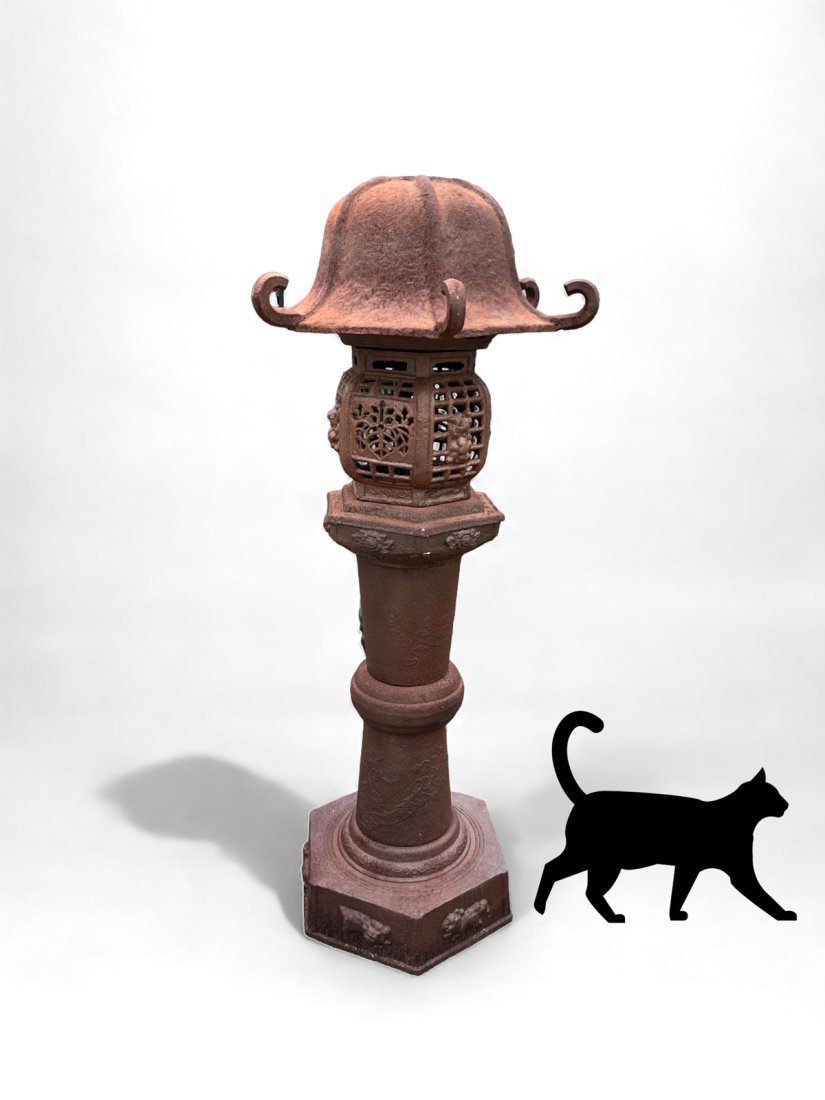 CAST IRON ASIAN PAGODA FORM GARDEN STATUE: CAST IRON ASIAN PAGODA FORM GARDEN STATUE: A large cast iron Pagoda form garden lantern. A lattice-work light box with door is surmounted by sloped Pagoda form rooftop with hooked eaves. Upon a decora