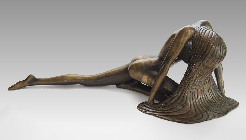 ATTRIBUTED TOM BENNETT SMALL NUDE BRONZE: BENNETT, Tom, ATTRIB, (American, 20th C.): Sprawling Female, 7 1/2" h., 23" length.