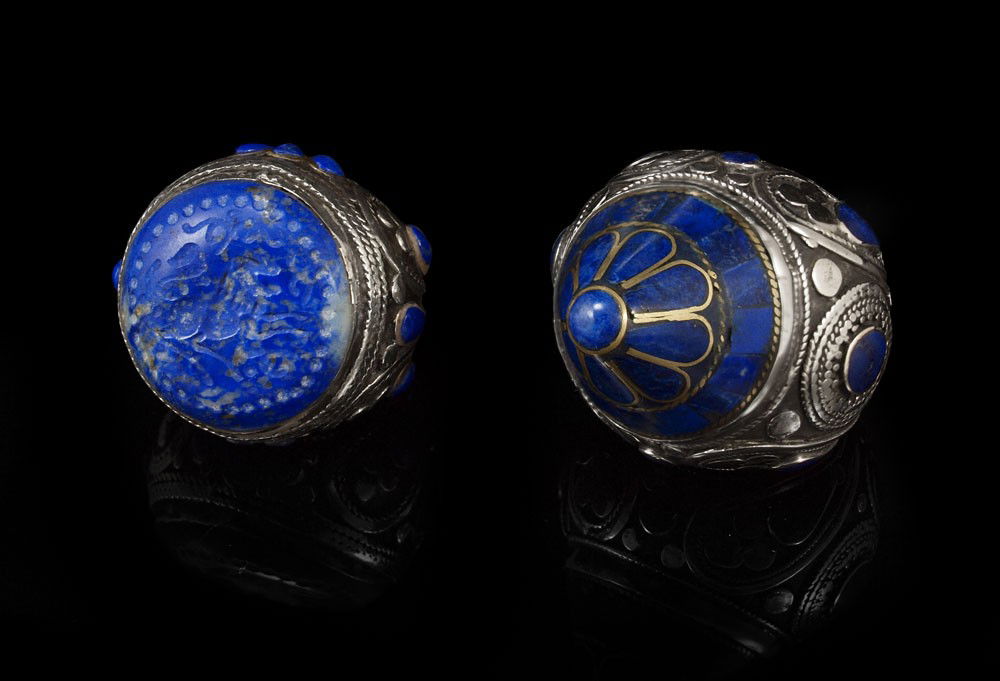 SILVER SODALITE LAPIS SULTAN RINGS: SILVER & GEMSTONE SULTAN RINGS: 1) Sodalite intaglio carved with roaring lion, approx. size 9, measures 1 3/4'' x 1 3/4'' x 1 3/4'', 2.57 troy oz. 2) Lapis panel and cabochon in a peaked design, appro