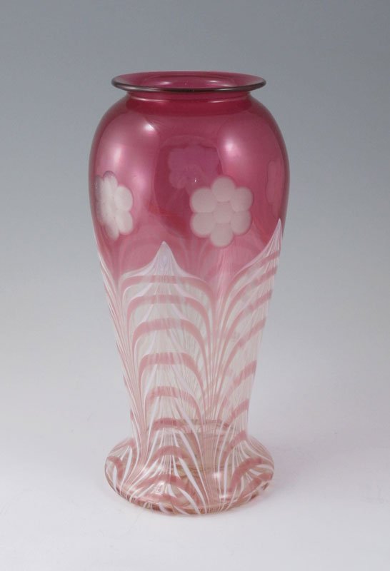 DURAND CRANBERRY PULLED FEATHER ART GLASS VASE: DURAND CRANBERRY PULLED FEATHER ART GLASS VASE: Intaglio cut flowers over pulled feather design, 9 3/4" tall. As shown in John Schumans American Art Glass page 66. Unsigned. Please note barely visible