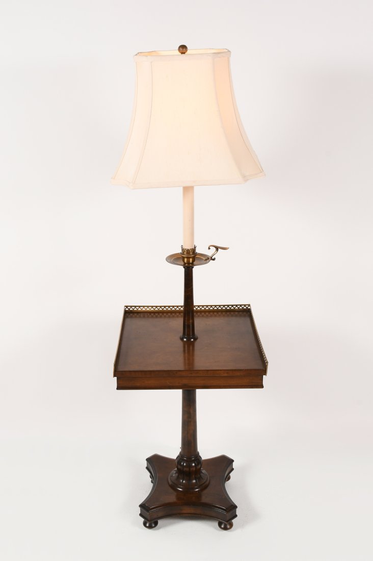 FREDERICK COOPER LAMP/TABLE: FREDERICK COOPER LAMP/TABLE: Pedestal tray table floor lamp, having pierced brass gallery trim around a square tabletop. The lamp accented by brass chamberstick and faux candle style column with one s