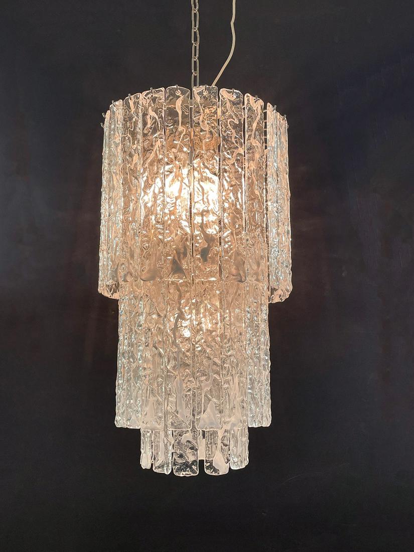 VINTAGE TIERED MURANO ART GLASS CHANDELIER: VINTAGE TIERED MURANO ART GLASS CHANDELIER: 7- light, 3- tiered Italian Murano chandelier with hanging clear & white drizzle glass planks. Approx. 30.5" h x 17.5" dia. Purchased from CENEDESE & GASPAR