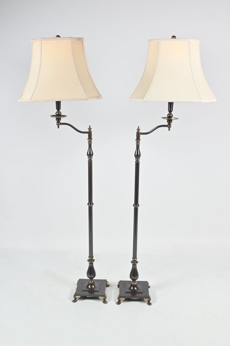 PR. FREDERICK COOPER FLOOR LAMPS: PR. FREDERICK COOPER FLOOR LAMPS: A pair of swing arm floor lamps w/ antiquated finish, paw feet, and weighted bases. Each topped by a square lampshade. Approx. 61" h. Base is approx. 8.75" w 8.75" d.