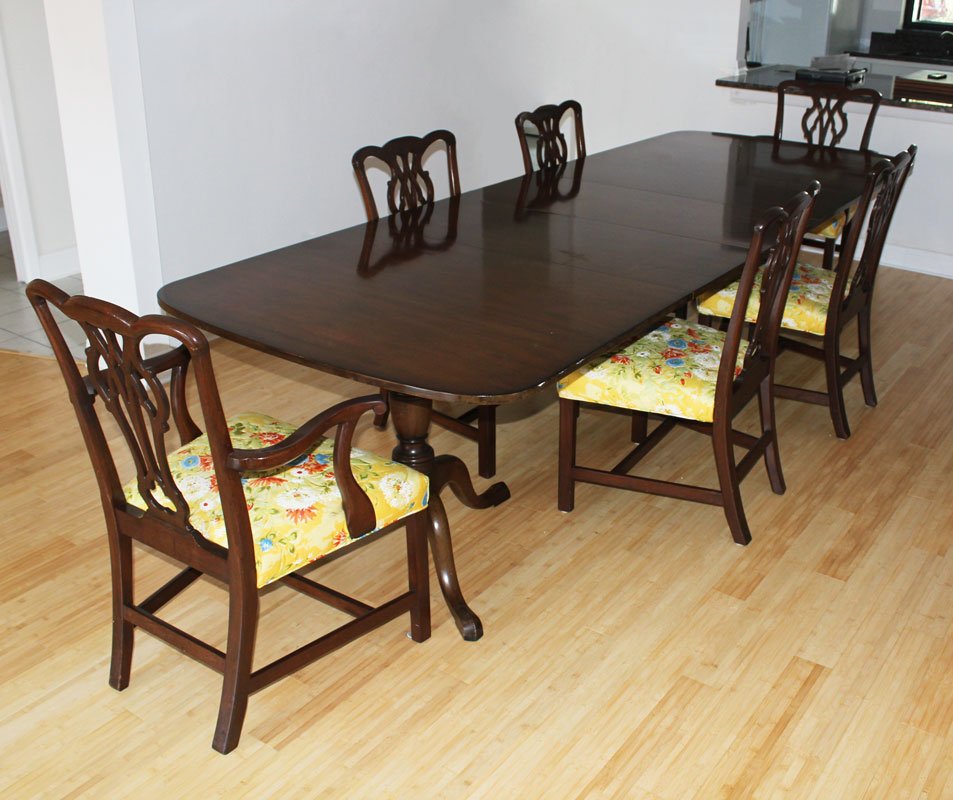 KITTINGER MAHOGANY DINING TABLE, 3 LEAVES + 6 CHAIR: KITTINGER CHIPPENDALE STYLE MAHOGANY DINING TABLE, 3 LEAVES AND 6 CHAIRS: Double pedestal table, paper label "Kittinger Buffalo, GV100 C, Series 21". Table measures 29 3/4" h. x 68 1/2" x 45", leaves 