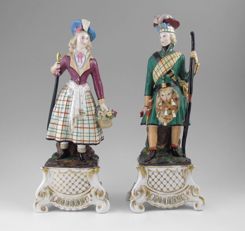 SITZENDORF PORCELAIN SCOTTISH FIGURES: EARLY SITZENDORF FIGURES MODELED AS SCOTTISH MAN & WOMAN: To include 1) Man with longbow, attired in traditional Scottish attire. 12 3/4" h. x 5" x 3 7/8". 2) Woman holding basket of flowers and walki