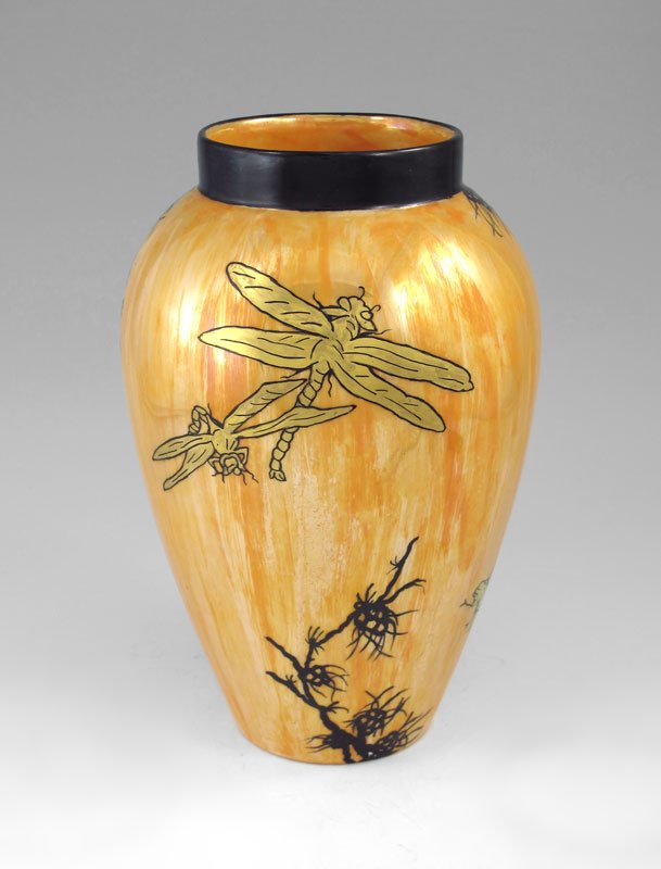 BERNARDAUD LIMOGES SILHOUETTE DRAGONFLY VASE: BERNARDAUD LIMOGES SILHOUETTE DRAGONFLY VASE: Orange opalescent glaze with hand painted dragonflies and foliate motif. Underglaze Bernardaud & Co. Limoges mark with artist initials M.R.K. 9 1/4" h. x