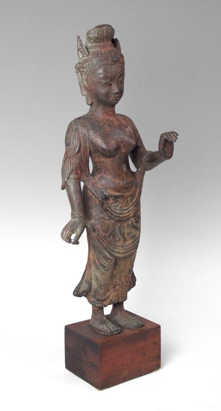 28" tall METAL CLAD BUDDHIST FIGURE: METAL CLAD BUDDHIST FIGURE: Traces of paint remain. Mounted on wood stand. Approx. 28 1/2" tall. 20th C.