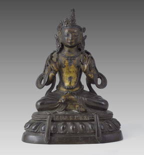 BRONZE TIBETAN SEATED BUDDHA: BRONZE TIBETAN BRONZE BUDDHA: 7 1/2" tall. Loss of one point on the head piece. Age unknown.