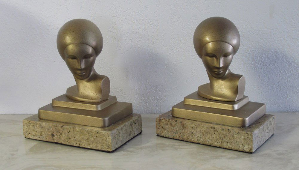 ART DECO FRANKART BUST BOOKENDS: ART DECO FRANKART BUST BOOKENDS: Figural female busts in classic art deco styling with marble bases. Marked under bust. Measures 7" h. x 6 1/8" x 4".