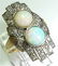 1070C: DARLING DIAMOND AND OPAL RING