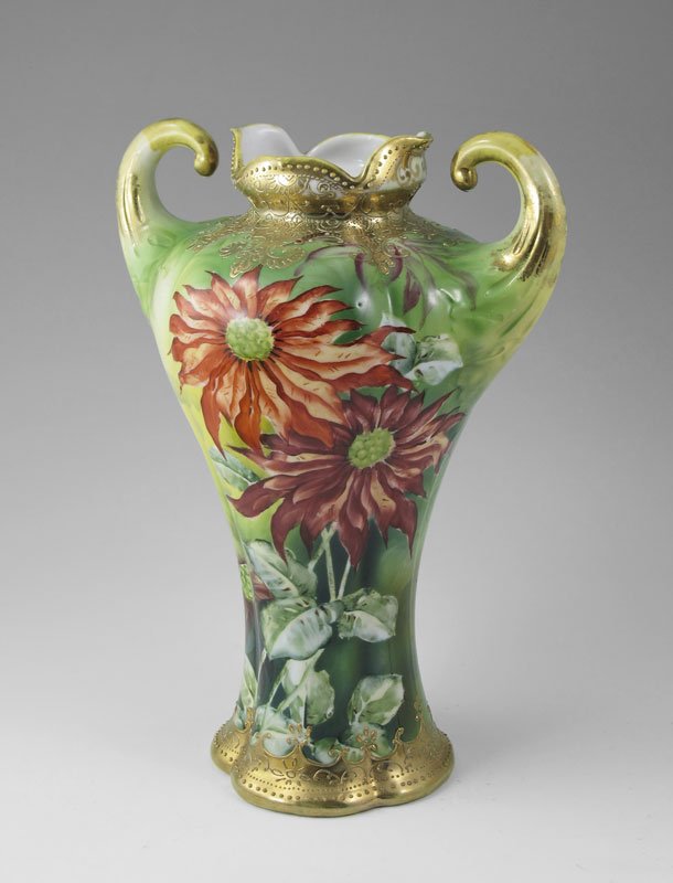 HAND PAINTED PORCELAIN VASE 10 1/2'' TALL: NIPPON HAND PAINTED PORCELAIN VASE: Bold coloration, parcel gilt. Double scroll handles. Approx. 10 1/2'' tall x 8'' at the widest. Blue maple leaf mark.