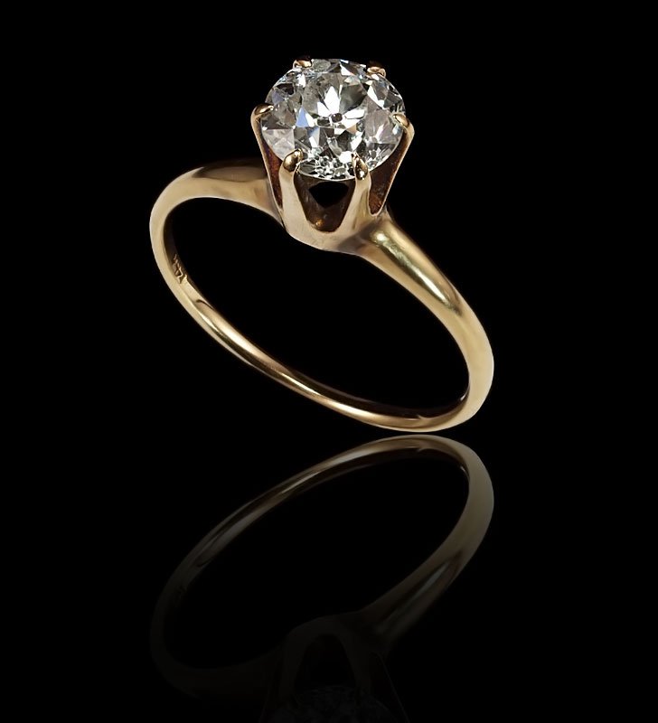 1.25 Ct OLD EUROPEAN CUT DIAMOND SOLITAIRE: ESTATE 1.25 CT DIAMOND SOLITAIRE RING: An antique 14K yellow gold ring with an approx. 1.25 Ct Old European cut diamond, rated VS1 in clarity and I color. Prong set. Size 7. Weight 2.3 grams. Sold wit