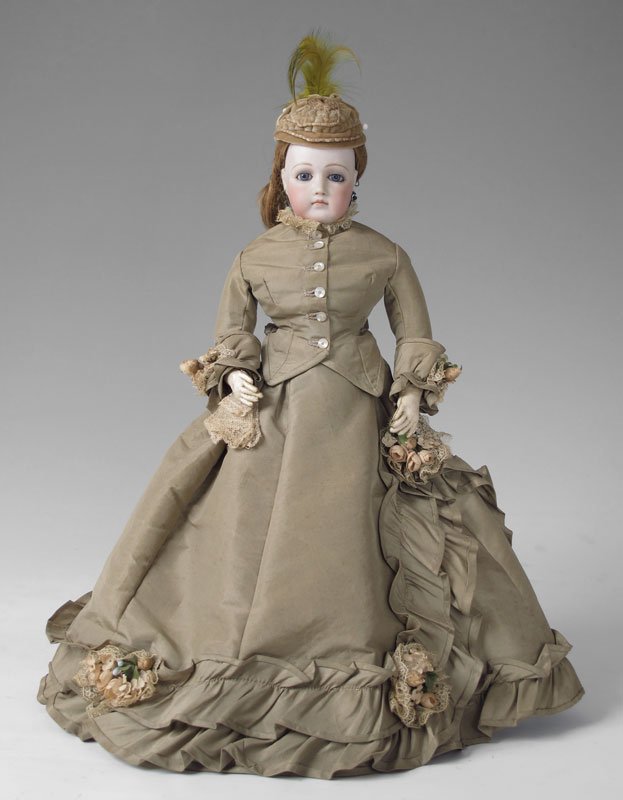 JUMEAU FRENCH FASHION POUPEE DOLL: FRENCH JUMEAU POUPEE SWIVEL HEAD FASHION DOLL: Swivel bisque head with stationary blue glass eyes, painted eye brows and lashes, closed mouth, blush cheeks, and pierced ears. Hair, hat and clothing ap