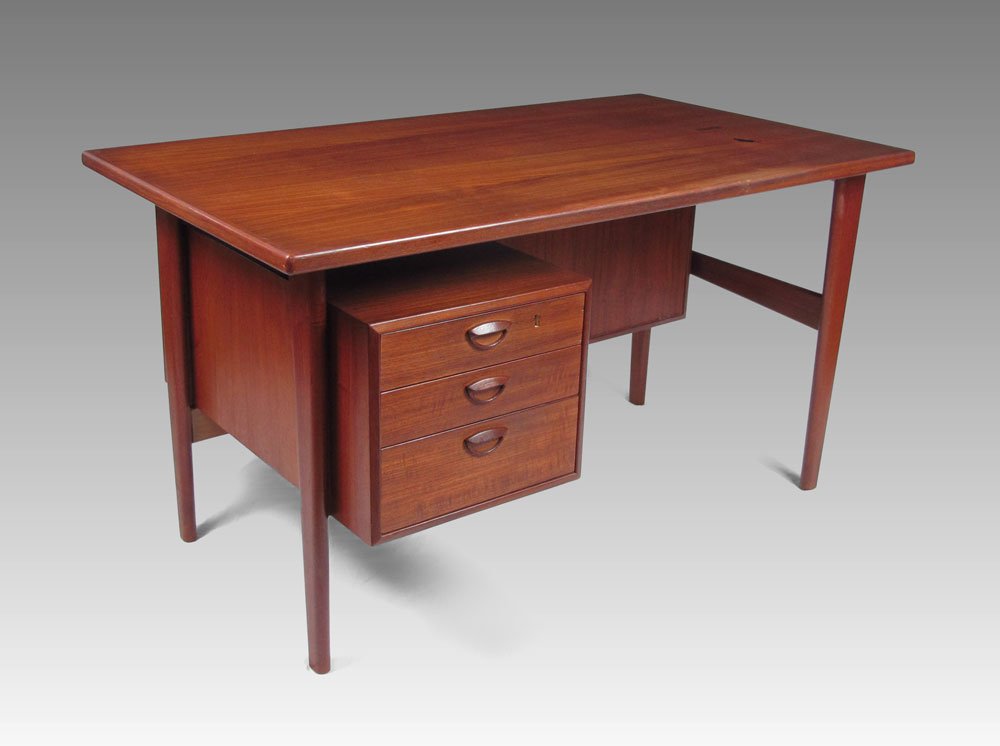 KAI KRISTENSEN DANISH MODERN DESK AND ARNE VODDER: KAI KRISTENSEN DANISH MODERN DESK AND ARNE VODDER CHAIR: 3 drawer desk with 2 cubby holes opposite side. Unmarked as to maker. 31 1/2" h. x 53" x 30 3/4". Comes with Arnie Vodder arm chair, unmarked,