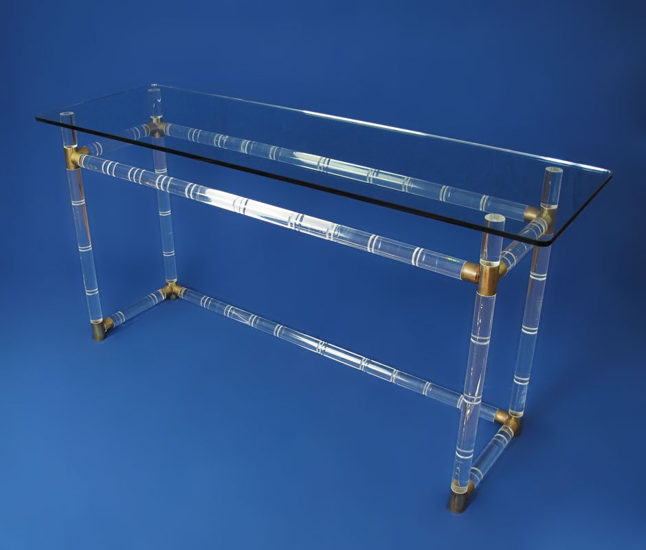 CHARLES HOLLIS JONES SOFA TABLE GLASS TOP: CHARLES HOLLIS JONES SOFA TABLE: Lucite and brass frame with glass top. 29'' h. x 56'' x 18''.