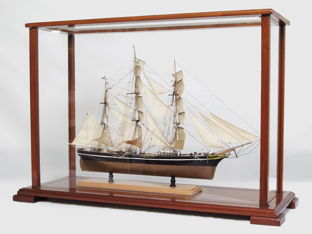 CLIPPER SHIP MODEL IN CASE: CLIPPER SHIP MODEL IN CASE: Hand crafted clipper ship model on stand with wood and glass case. Ship measures 15" x 24 1/2". Case measures 21" x 31 1/2" x 12".