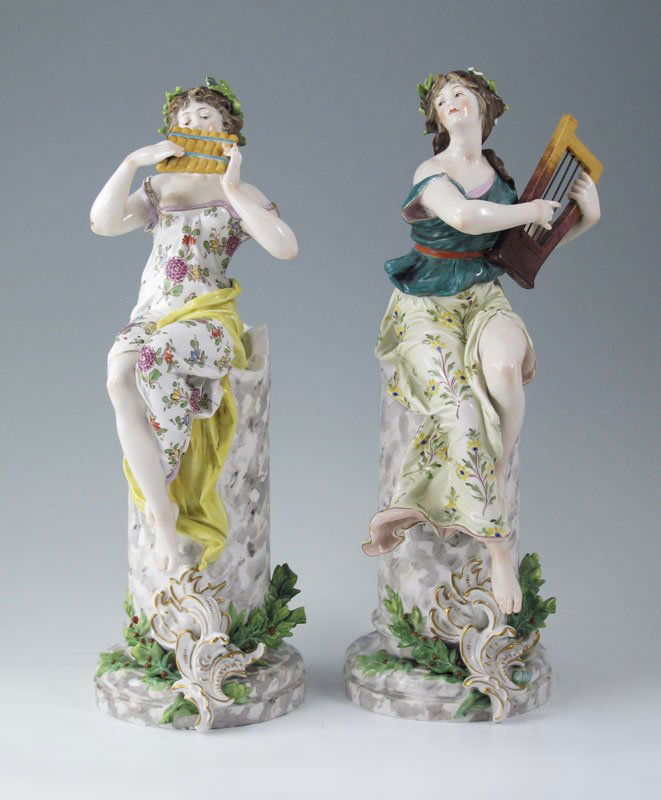 EARLY CAPODIMONTE MUSICAL FIGURINES: EARLY CAPODIMONTE MUSICAL FIGURINES: One with a flute, the other a harp. Approx. 12'' tall. Blue mark under glaze.