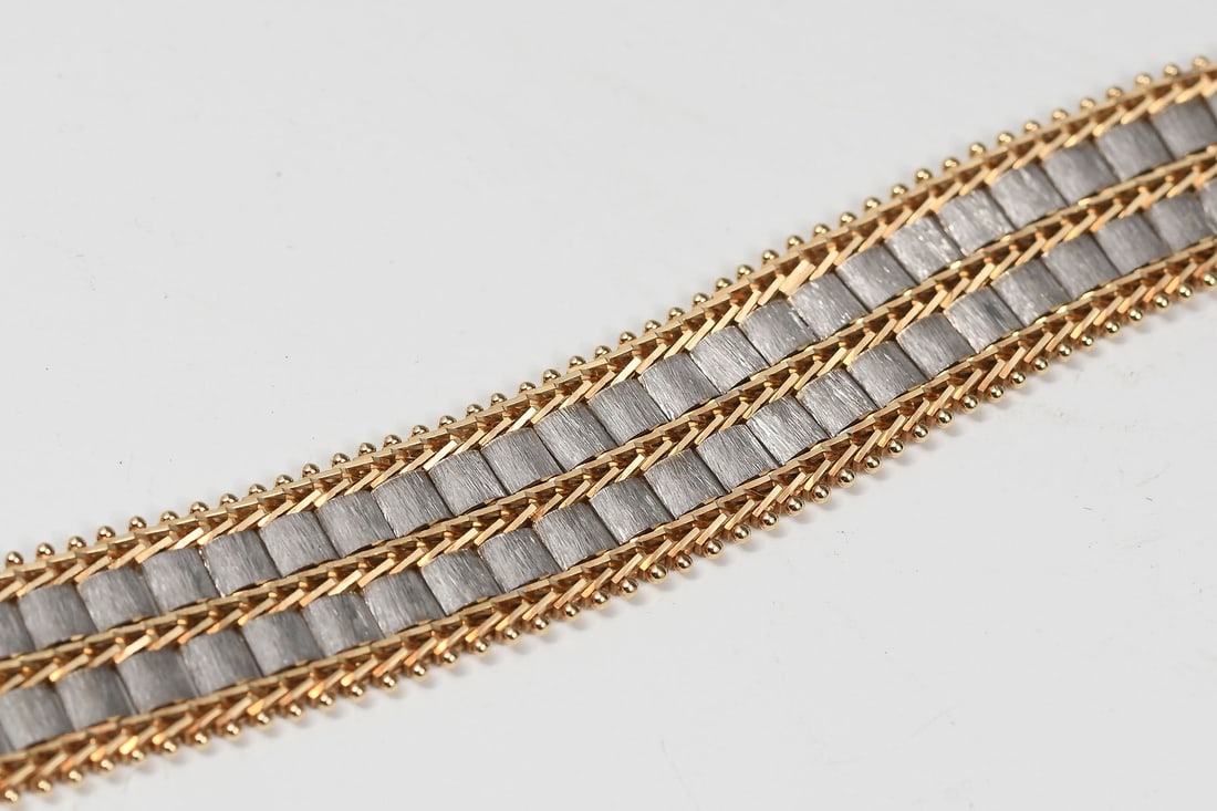 14K 2-TONE GOLD MESH BRACELET: 14K 2-TONE GOLD MESH BRACELET: Crafted by Imperial Jewelry, this two-tone link bracelet features velvet-finish white gold vertical links within gleaming gold, finely crafted Riccio links. With a hidde