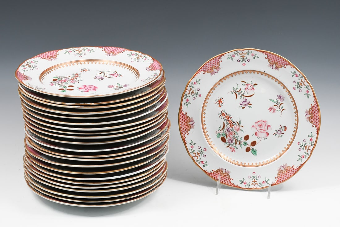 23 PC. CHINESE FAMILLE ROSE ENAMELED PLATES: 23 PC. CHINESE FAMILLE ROSE ENAMELED PLATES: A collection of twenty-three Chinese export porcelain dinner plates with gilt and floral adornment in hues of pink, red, lavender, and green. Approx. 10.25