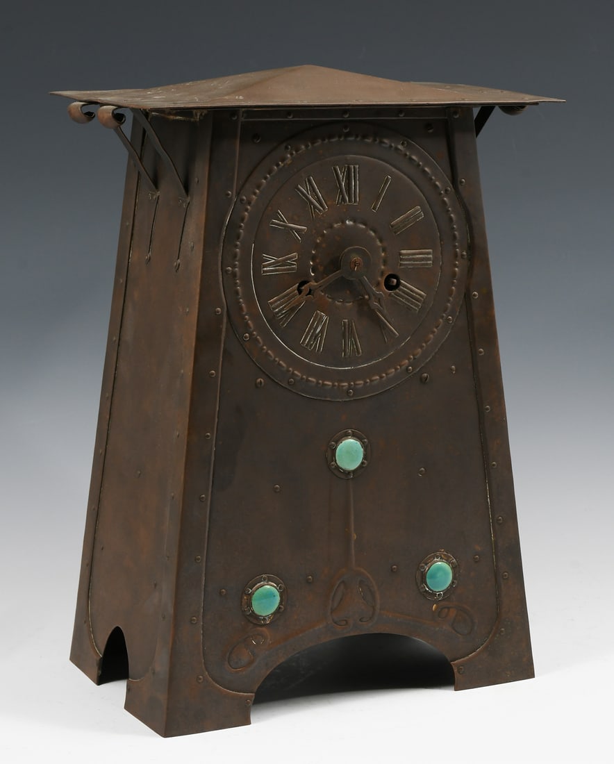 EMBOSSED COPPER ARTS & CRAFTS MANTLE CLOCK: EMBOSSED COPPER ARTS & CRAFTS MANTLE CLOCK: Art & Crafts mantle clock crafted of copper with projecting cornice above the case, decorated with Art Nouveau repousse work and three mounted turquoise blu