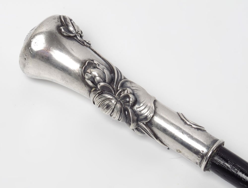 KERR ART NOUVEAU STERLING HANDLE WALKING STICK: KERR ART NOUVEAU STERLING HANDLE WALKING STICK: Floral art nouveau style sterling handle marked Kerr, Sterling, 1404. Monogrammed on top. Ebonized wood shaft, missing tip. Overall 38 1/2''l.