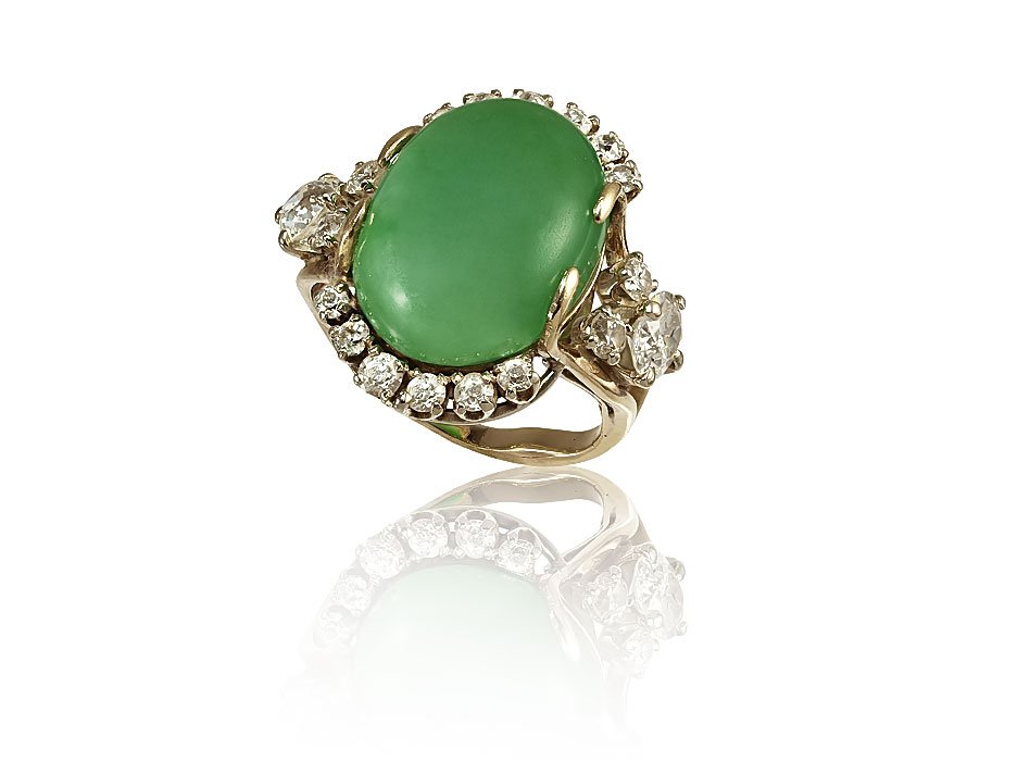 JADE & DIAMOND 14K YG RING: JADE & DIAMOND RING: 14K yellow gold ring centers one 16.50 x 12.50 mm piece of green jadeite jade. Framing the diamond and in the shank are 20 old European, old mine and round full cut and single cut