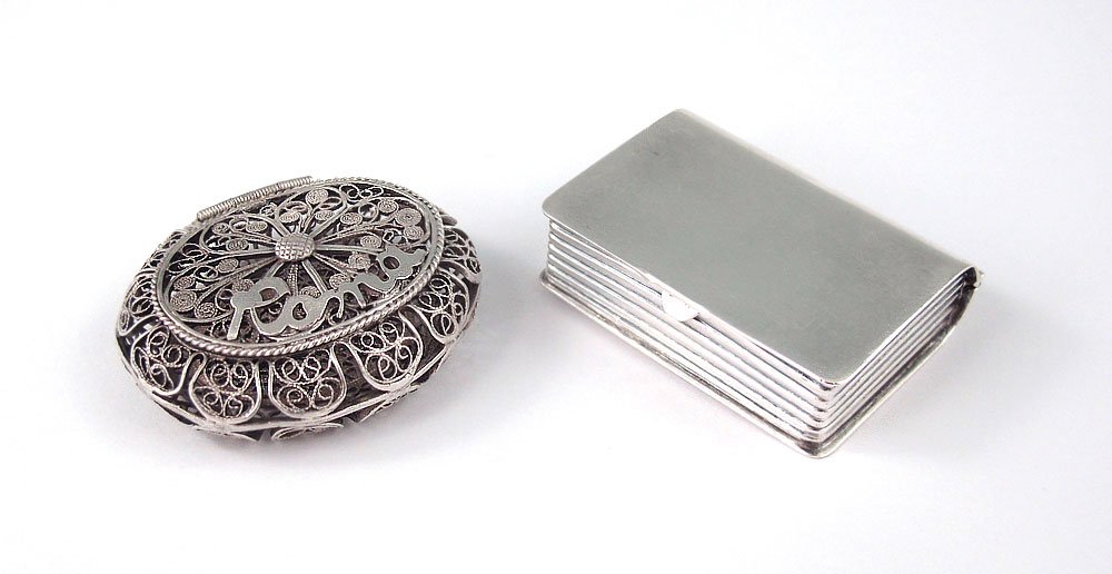 2 MINIATURE SILVER BOXES: 2 MINIATURE SILVER BOXES: Mexican Sterling "Book" pill box, hinged lid, marked Plat.Mex.S.A 925 Eagle mark 20, 1 1/2" x 1 1/8" x 3/8", .5 Troy oz. and an Italian 800 silver wire work lidded basket "Ro