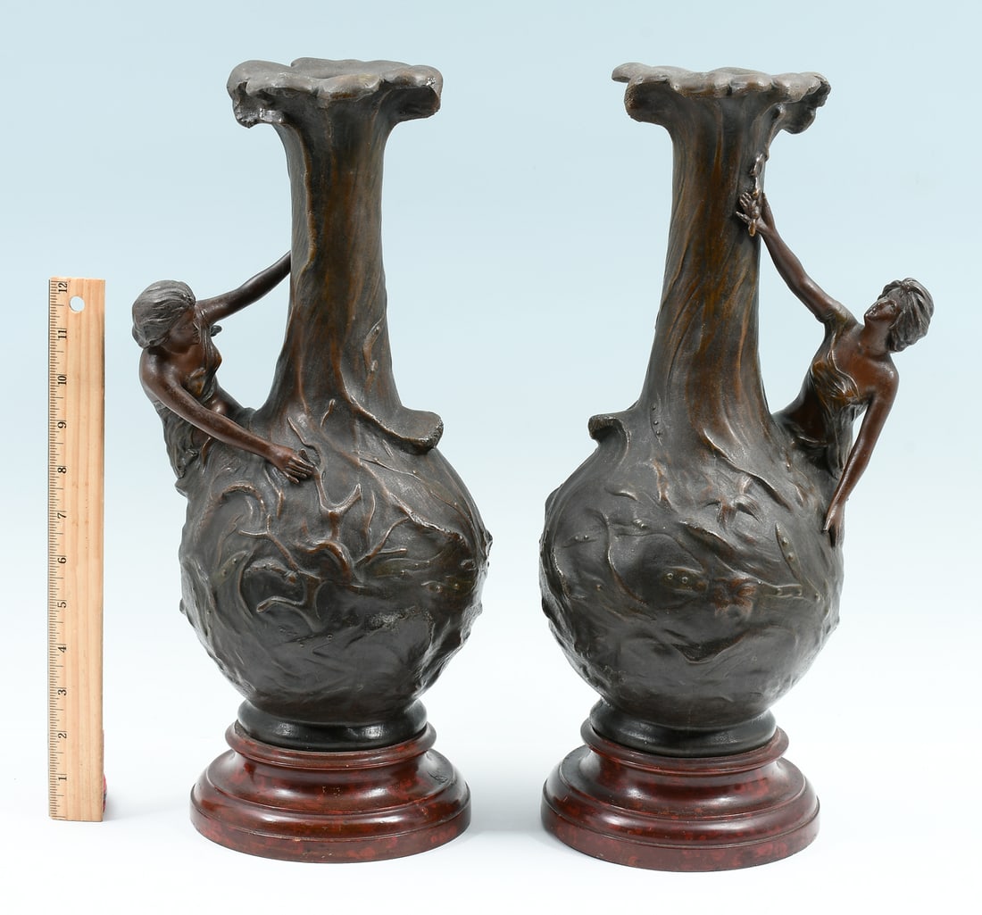 PAIR OF ART NOUVEAU FIGURAL BRONZE VASES: PAIR OF ART NOUVEAU FIGURAL BRONZE VASES: French Art Nouveau Bronze Figural Vase, c. 1890, having a mermaid and waterspout motif. Signed ''J. Garnier'' (French, 1820-1895). Both mounted on wood bases.
