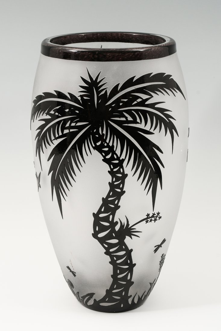 DUNCAN MCCLELLAN CAMEO GLASS VASE: DUNCAN MCCLELLAN CAMEO GLASS VASE: Duncan McClellan (American b. 1955), blown and etched cameo style glass vase, black to frosted clear ground, depicting palm trees, birds, butterflies, dragonflies, a