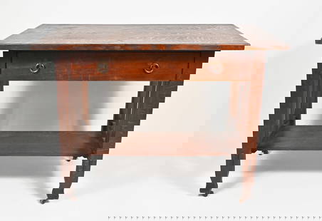 STICKLEY QUAINT FURNITURE SLAT SIDE LIBRARY DESK: STICKLEY QUAINT FURNITURE SLAT SIDE LIBRARY DESK: Early 20th c. Having a broad surface over a single drawer with iron loop pulls. On square legs joined by slatted sides and a wide lower median