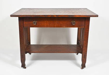 STICKLEY QUAINT FURNITURE SLAT SIDE LIBRARY DESK: STICKLEY QUAINT FURNITURE SLAT SIDE LIBRARY DESK: Early 20th c. Having a broad surface over a single drawer with iron loop pulls. On square legs joined by slatted sides and a wide lower median stretch