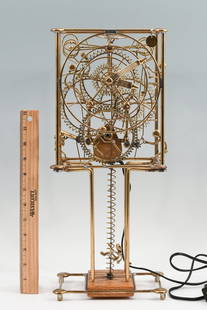 KINETICO STUDIOS BRASS SEVEN MAN CLOCK: KINETICO STUDIOS BRASS SEVEN MAN CLOCK: ''Seven Man Clock'' kinetic skeletal clock with figures & gears in motion as the electric clock runs. Sculpted of welded brass. Designed by Gordon Brandt for