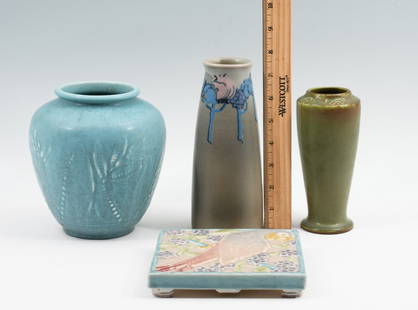 4 PIECE ROOKWOOD POTTERY VASES & TILE: 4 PIECE ROOKWOOD POTTERY VASES & TILE: This 4-piece Rookwood pottery collection includes 1) Tapered bottle vase model 1660E, in pale green with fruit motif at upper portion, dated 1919. Approx. 7.75''