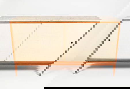 PAUL MCCOBB PLANNER GROUP SIDEBOARD/CREDENZA: PAUL MCCOBB PLANNER GROUP SIDEBOARD/CREDENZA: A mid-century Planner Group sideboard designed by Paul McCobb. With sliding doors opening to a single drawer at the left and three stacked drawers at the
