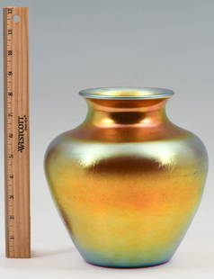 STEUBEN AURENE ART GLASS VASE: STEUBEN AURENE ART GLASS VASE: Steuben gold Aurene glass vase in iridescent hues of gold, blue; having a flared opening over wide shoulder tapering downwards to base. Polished pontil mark; with etched