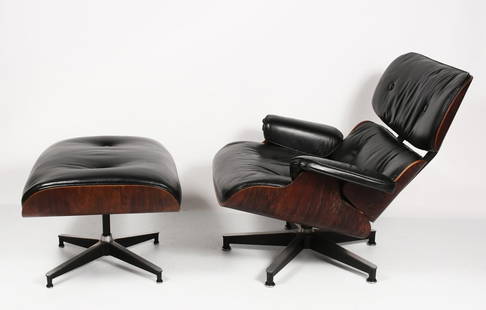 HERMAN MILLER CHAIR AND OTTOMAN: HERMAN MILLER CHAIR (670) AND OTTOMAN (671): Charles Eames (1907-1978) & Ray Eames (1912-1988) for Herman Miller 670 / 671 lounge chair and ottoman, comprised of rosewood, black leather, aluminum,