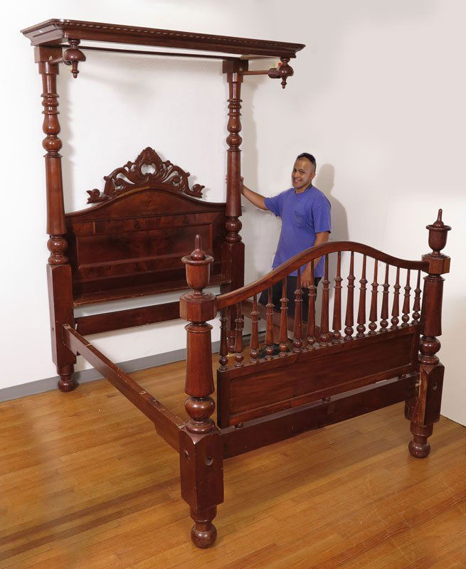 VICTORIAN TESTER BED: VICTORIAN TESTER BED: Top section with rope twist decoration, downward spire finial, turned supports. Headboard with carved crest. Foot board with turned spindles and spire finials. Family history rec