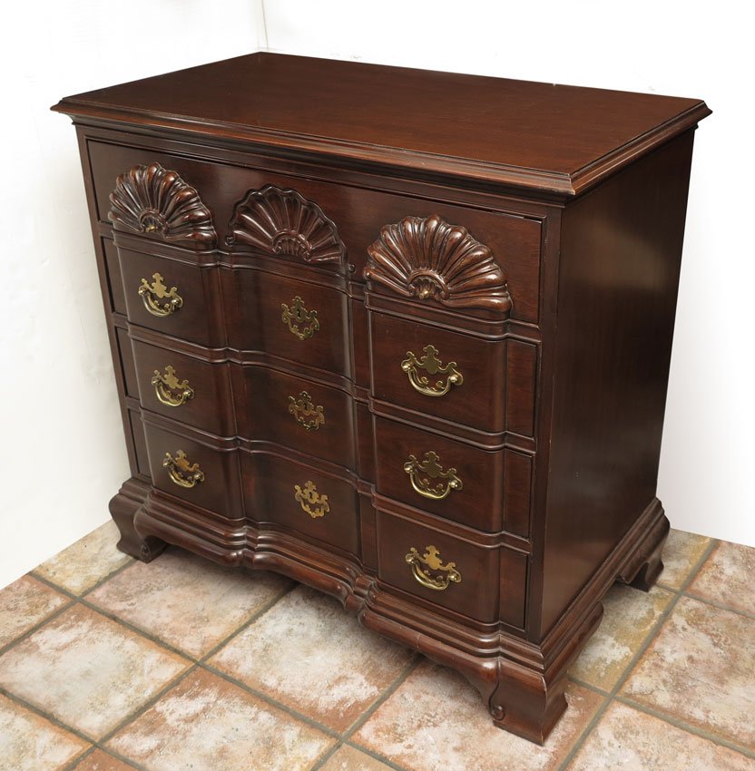 DREXEL MAHOGANY 4 DRAWER CHEST: DREXEL MAHOGANY 4 DRAWER CHEST: Shaped front with shell carved motif on top drawer, brass pulls and escutcheons on 3 lower drawers. Marked Drexel inside top drawer. Measures 34 3/4" x 36" x 19 1/4".
